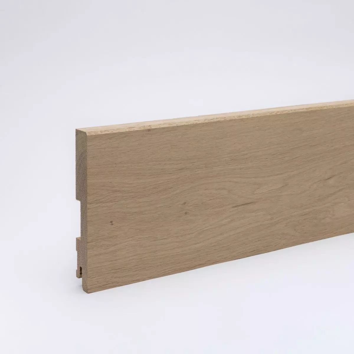 Solid wood skirting 120mm bevelled front edge - oak varnished