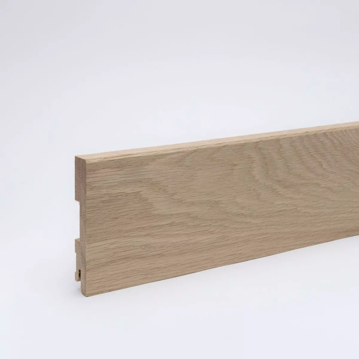 Solid wood skirting board 100mm bevelled front edge - oak raw