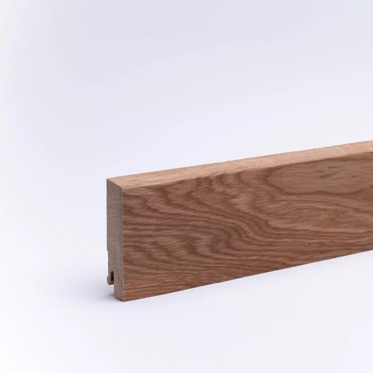 Solid wood skirting board 80x16mm beveled front edge - oak oiled