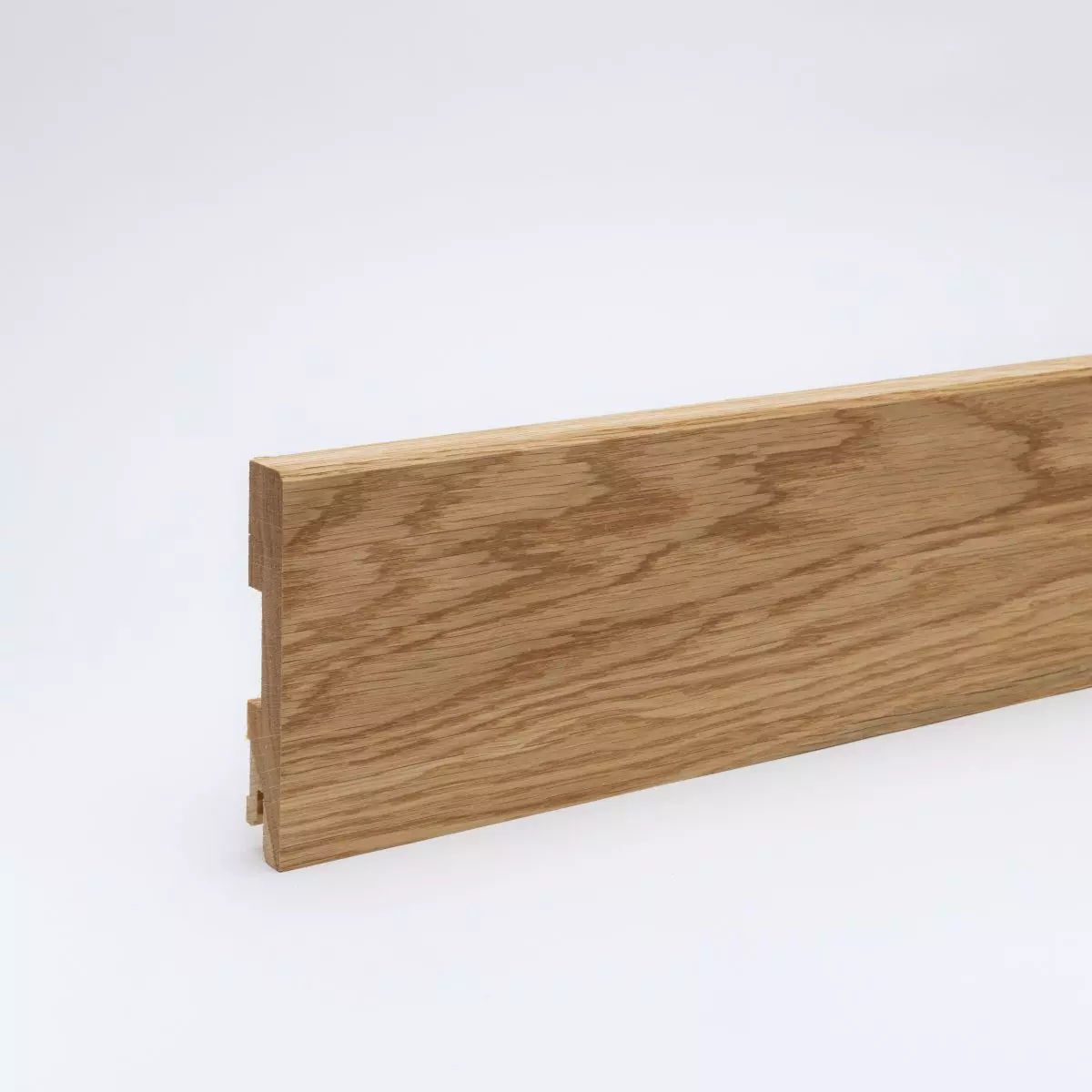 Solid wood skirting 100mm bevelled front edge - oak oiled
