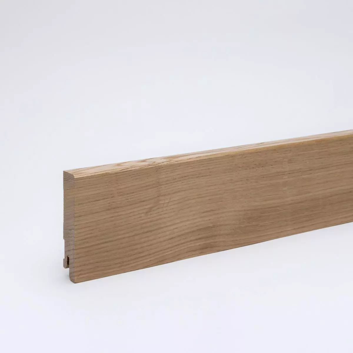 Solid wood skirting board 80x16mm chamfered leading edge  - lacquered oak